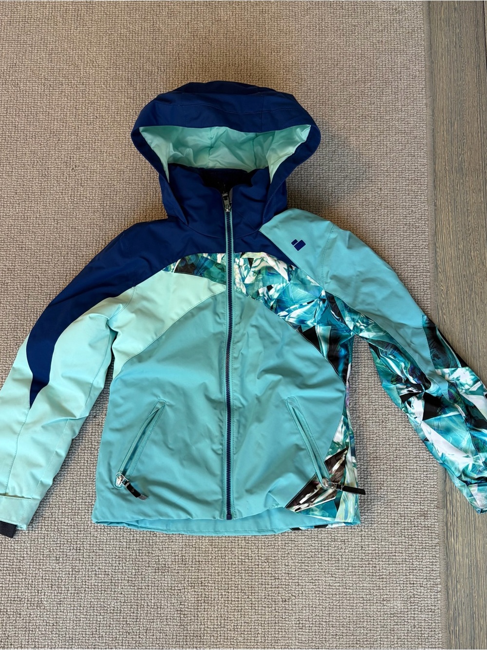 Obermeyer Aqua and Navy Girls' Hooded Ski Jacket with Patterned Sleeve